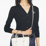 White bags worn by a person, showing the bgas's fit