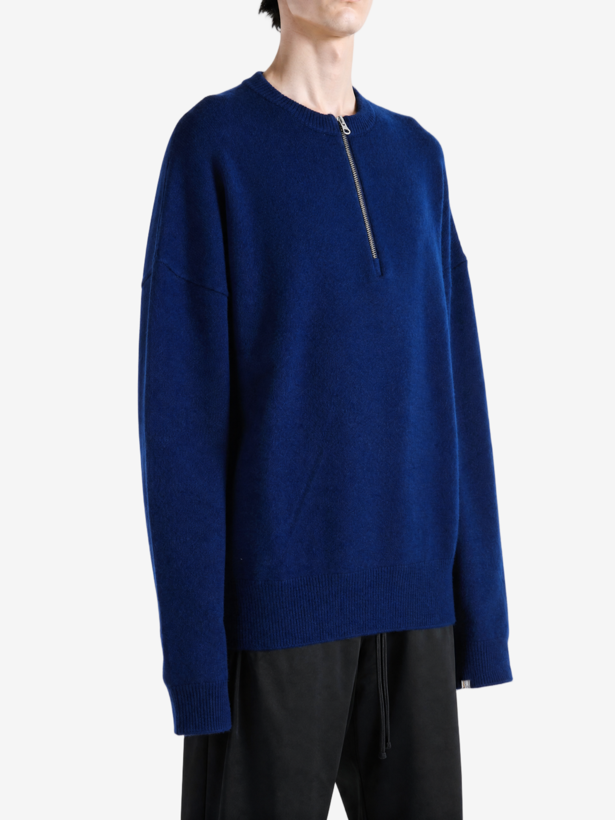 Navy hoodie worn by a person, showing the hoodie fit