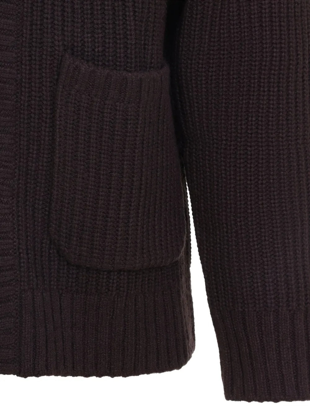 Close up of brown jackets, showing texture of the acrylic and wool and nylon fabric