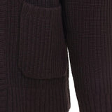 Close up of brown jackets, showing texture of the acrylic and wool and nylon fabric