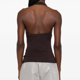 Brown top worn by a person, showing the top's fit