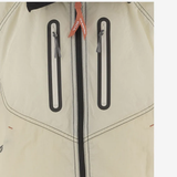 Close up of white jacket-coat, showing texture of the nylon fabric