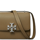 Close up of brown bags, showing texture of the leather fabric