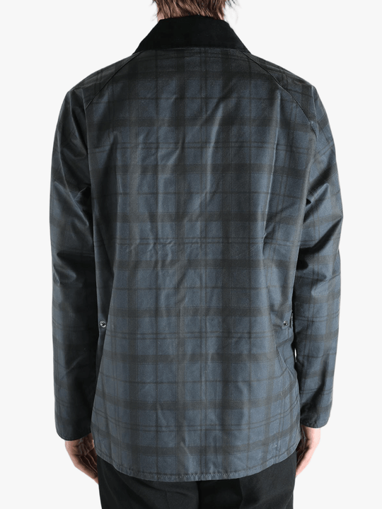 Blue jacket worn by a person, showing the jacket's fit