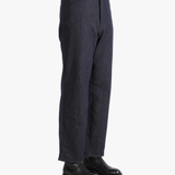 Blue pants worn by a person, showing the pants fit