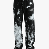 Black pants worn by a person, showing the pants' fit