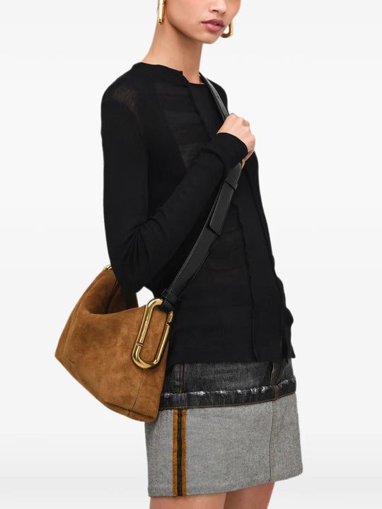 Brown bag worn by a person, showing the bag fit