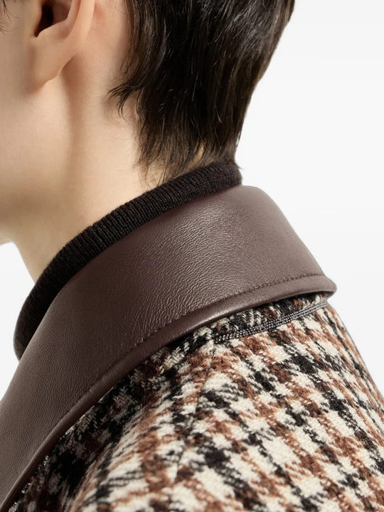 Brown jacket worn by a person, showing the jacket fit