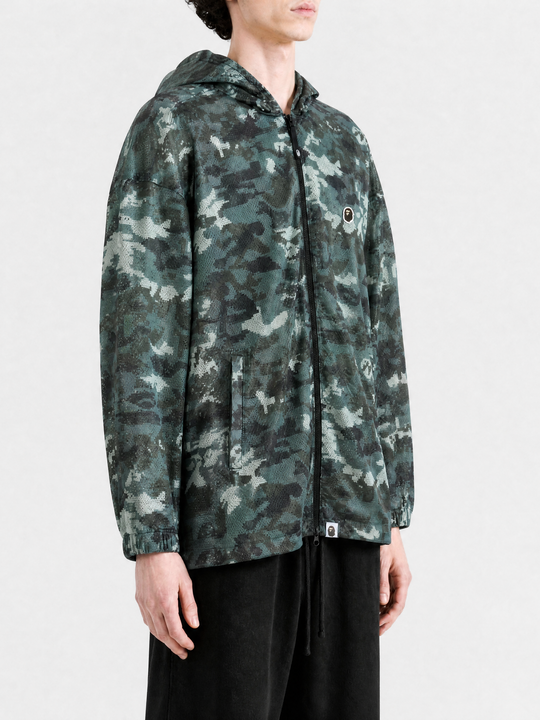 Green jacket worn by a person, showing the jacket fit