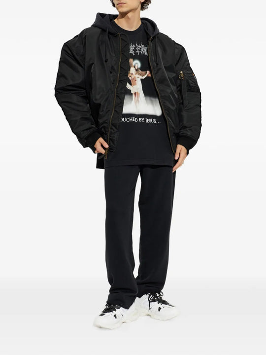 Black t-shirt, full body view