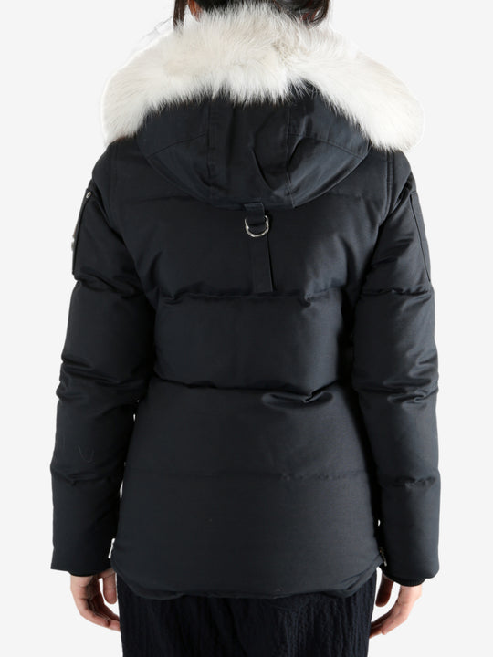 Black jackets worn by a person, showing the jackets fit