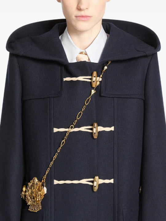 Brown jewelry worn by a person, showing the jewelry fit