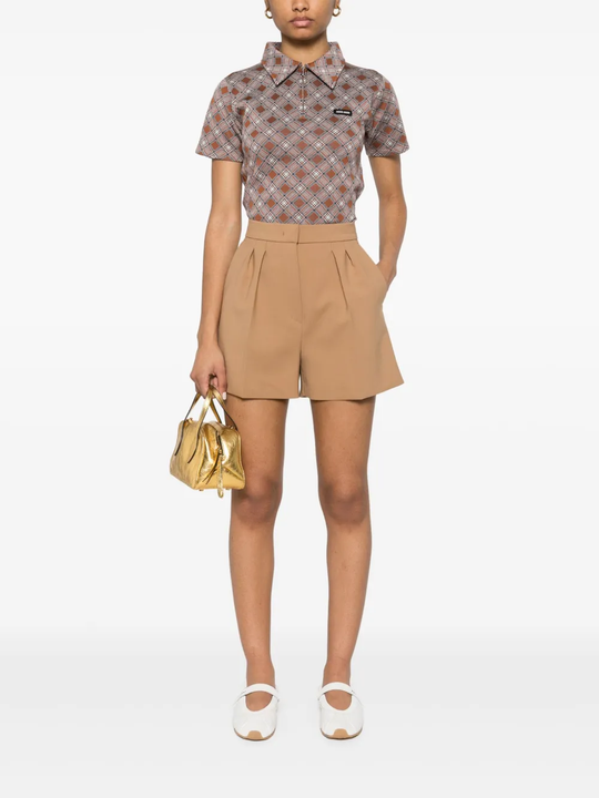 Brown shirt worn by a person, showing the shirt's fit