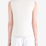 Tan top worn by a person, showing the top fit