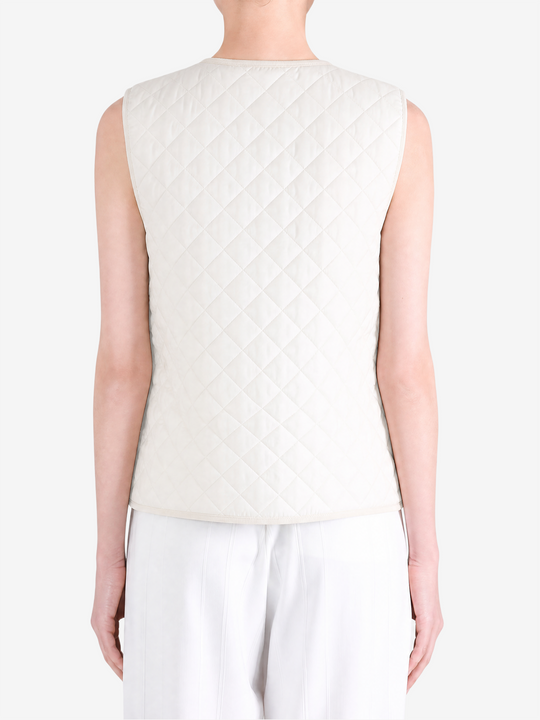 Tan top worn by a person, showing the top fit