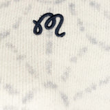 Close up of Tan shirt, showing texture of the 90% wool/ 10% cashmere fabric