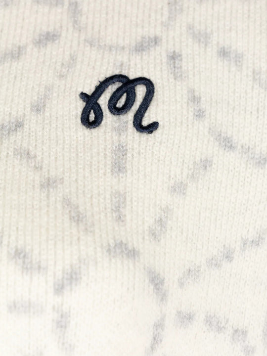 Close up of Tan shirt, showing texture of the 90% wool/ 10% cashmere fabric