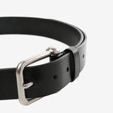 Close up of black belt, showing texture of the fabric