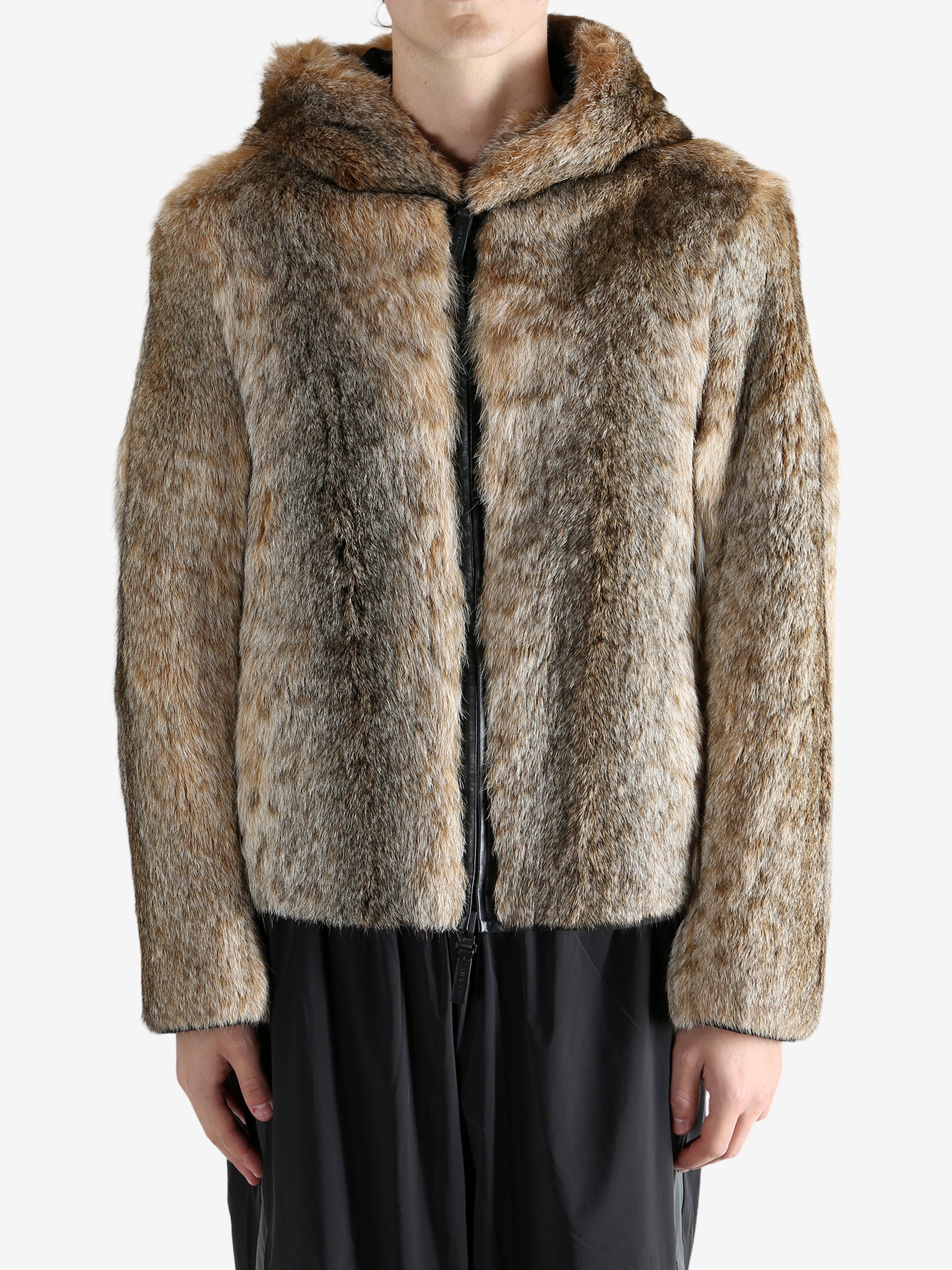 Tan jacket worn by a person, showing the jacket fit