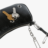 Close up of Black bag, showing texture of the leather fabric