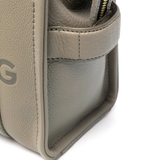 Close up of tan bag, showing texture of the calf leather fabric