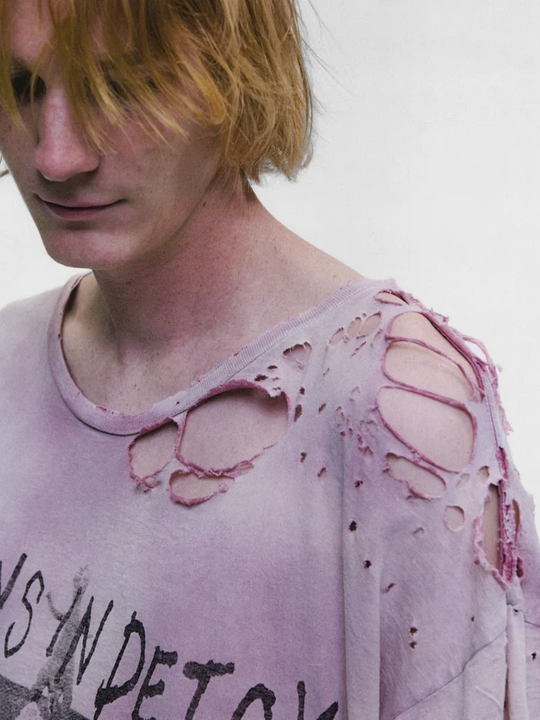 Purple t-shirt worn by a person, showing the t-shirt fit