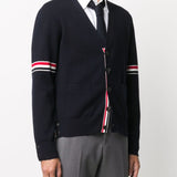 Navy cardigan,showing texture of the cotton fabric.