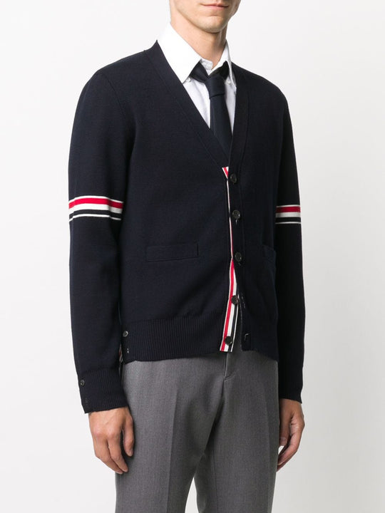 Navy cardigan,showing texture of the cotton fabric.