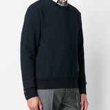 Navy hoodies worn by a person, showing the hoodies fit